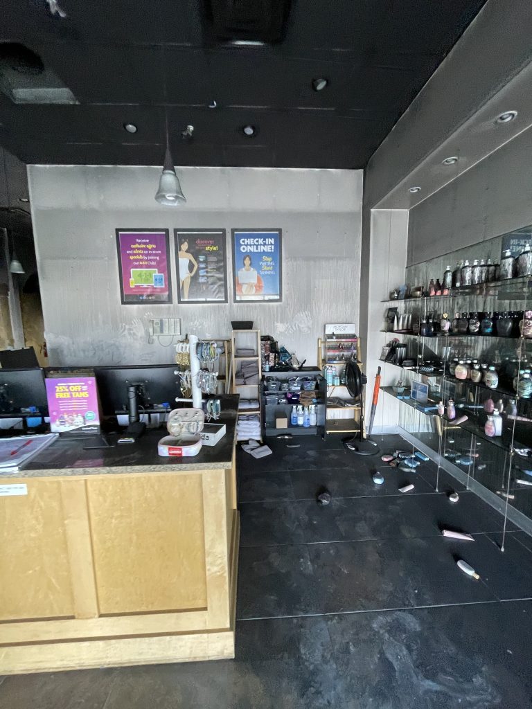 Sun Tan City lobby, fire damaged